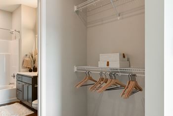 a walk-in closet attached to a bathroom at The Hallon Apartments, Minnesota, 55343